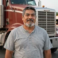 Carl D., an owner-operator flatbed driver running I-80 Wyoming who found genuine connection on RoadHeart