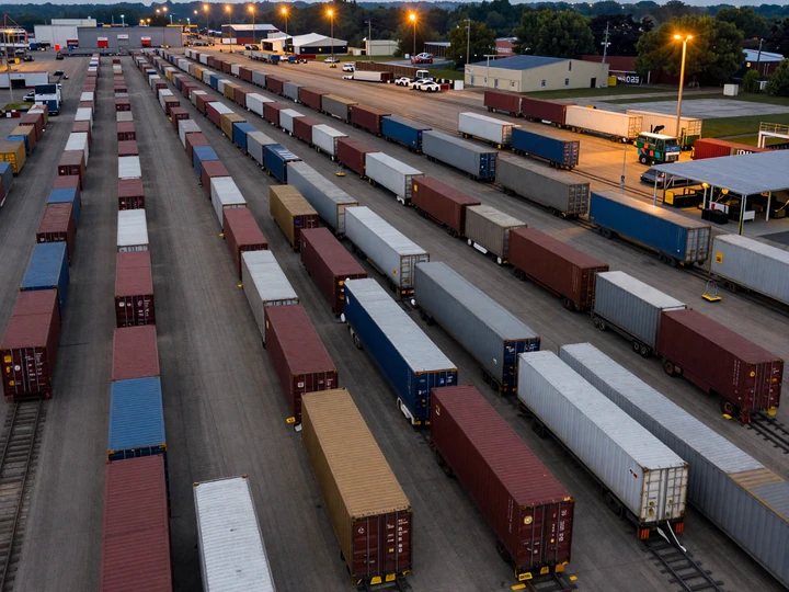 Aerial view of the Rickenbacker Inland Port intermodal yard in Columbus Ohio at dusk, a major hub for Ohio CDL drivers and trucker dating community